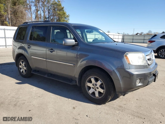 2011 Honda Pilot Touring with VIN 5FNYF4H97BB042570, listed as a Copart auction lot 42678115 with 162,030 mi miles and Clean Title. Bid and sale history available at carsss.com. Image 4.
