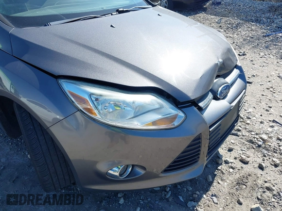 2012 Ford Focus SE with VIN 1FAHP3F27CL276208, listed as a IAAI auction lot 41995770 with 98,004 mi miles. Bid and sale history available at carsss.com. Image 13.