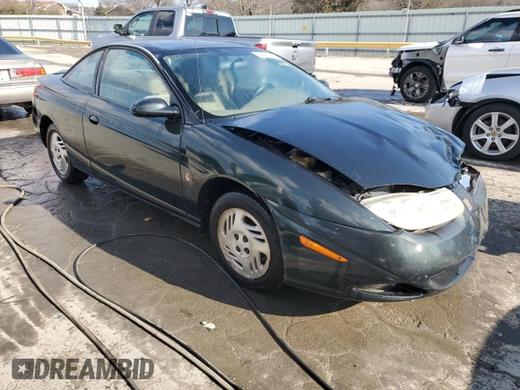 2001 Saturn SC z VIN 1G8ZR12721Z295252, wystawiony jako Copart lot #82608074 z przebiegiem 137 076 mil mil oraz Szkody całkowita. Historia ofert i sprzedaży dostępna na DreamBid. Obrazek 4.
