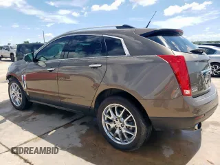 2014 Cadillac SRX Premium Collection with VIN 3GYFNDE33ES567108, listed as a Copart auction lot 55970265 with 97,720 mi miles and Salvage title. Bid and sale history available at DreamBid. Image 2.