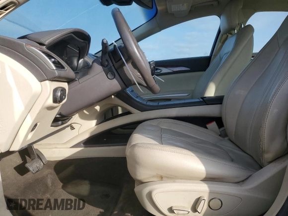 2014 Lincoln MKZ with VIN 3LN6L2JKXER806539, listed as a Copart auction lot 42724215 with 104,283 mi miles and Salvage title. Bid and sale history available at DreamBid. Image 7.