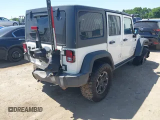 2014 Jeep Wrangler Unlimited Sport with VIN 1C4BJWDG1EL121190, listed as a IAAI auction lot 41913348 with 162,066 mi miles and . Bid and sale history available at DreamBid. Image 4.