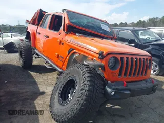 2020 Jeep Gladiator Rubicon with VIN 1C6JJTBG0LL164890, listed as a IAAI auction lot 41795545 with 77,860 mi miles and . Bid and sale history available at DreamBid. Image 1.