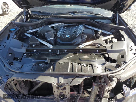 2021 BMW X6 M50i with VIN 5UXCY8C09M9E66884, listed as a Copart auction lot 63025622 with 26,220 mi miles and Salvage Title. Bid and sale history available at carsss.com. Image 7.