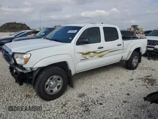 2014 Toyota Tacoma PreRunner with VIN 3TMKU4HN7EM040312, listed as a Copart auction lot 87420864 with 68,853 mi miles and Salvage title. Bid and sale history available at DreamBid. Image 1.
