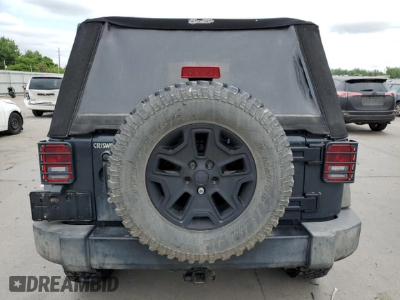 2016 Jeep Wrangler Black Bear with VIN 1C4AJWAGXGL209318, listed as a Copart auction lot 59539755 with 108,306 mi miles and Salvage title. Bid and sale history available at DreamBid. Image 6.