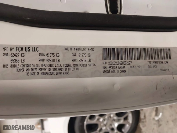 2016 Dodge Charger SXT with VIN 2C3CDXJG6GH282127, listed as a IAAI auction lot 41591877 with 82,331 mi miles. Bid and sale history available at carsss.com. Image 9.