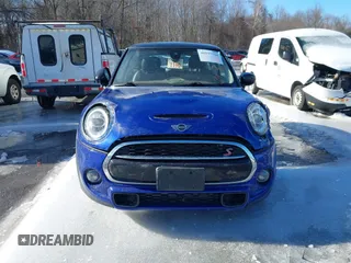2020 MINI Hardtop Cooper S z VIN WMWXR5C05L2L43423, wystawiony jako IAAI lot #41577721 z przebiegiem 108 123 mil mil oraz . Historia ofert i sprzedaży dostępna na DreamBid. Obrazek 12.