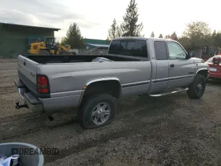 1999 Dodge Ram 2500 with VIN 1B7KF2362XJ504072, listed as a Copart auction lot 77649814 with 0 mi miles and Salvage Title. Bid and sale history available at carsss.com. Image 3.