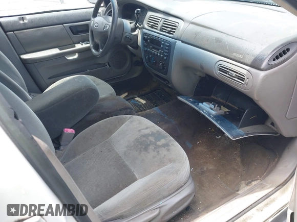 2003 Ford Taurus SE Standard with VIN 1FAFP53U13A192387, listed as a IAAI auction lot 42398723 with 247,077 mi miles and . Bid and sale history available at DreamBid. Image 5.