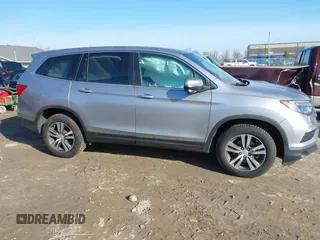 2017 Honda Pilot EX-L with VIN 5FNYF6H50HB059096, listed as a IAAI auction lot 41757214 with 165,651 mi miles and . Bid and sale history available at DreamBid. Image 13.