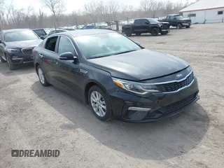 2019 Kia Optima LX with VIN 5XXGT4L33KG373375, listed as a IAAI auction lot 42005817 with 77,524 mi miles and . Bid and sale history available at carsss.com. Image 1.