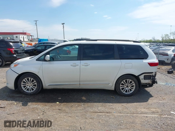 2015 Toyota Sienna XLE with VIN 5TDYK3DC8FS654902, listed as a IAAI auction lot 41953705 with 169,036 mi miles. Bid and sale history available at carsss.com. Image 14.