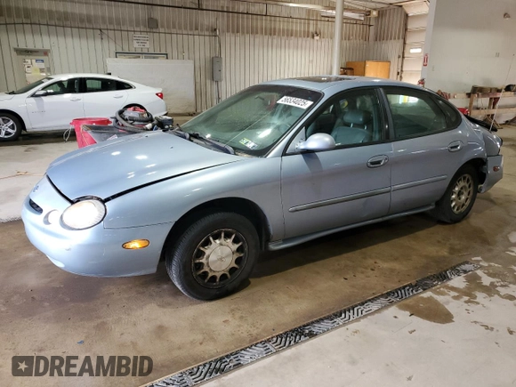 1997 Ford Taurus LX with VIN 1FALP53S8VA114239, listed as a Copart auction lot 56534025 with 110,834 mi miles and Salvage title. Bid and sale history available at DreamBid. Image 1.