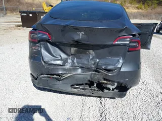 2023 Tesla Model Y Long Range with VIN 7SAYGAEE7PF971620, listed as a IAAI auction lot 41654688 with Not Provided miles and . Bid and sale history available at DreamBid. Image 6.