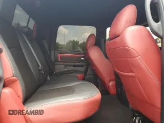 2016 Ram 1500 Rebel z VIN 1C6RR7YT0GS336788, wystawiony jako Copart lot #58507795 z przebiegiem Nie podano mil oraz Szkody całkowita. Historia ofert i sprzedaży dostępna na DreamBid. Obrazek 10.