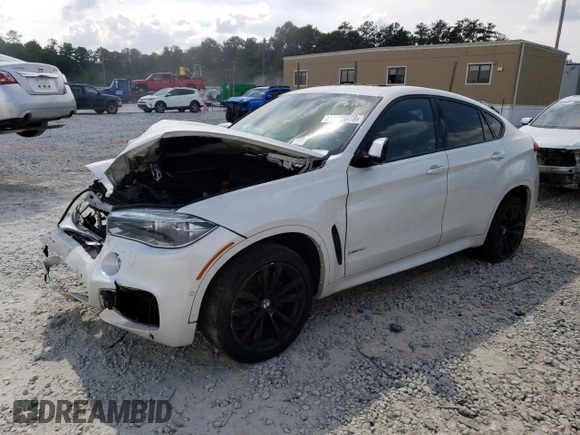 2019 BMW X6 xDrive35i with VIN 5UXKU2C52K0Z64679, listed as a Copart auction lot 69003673 with Not Provided miles. Bid and sale history available at carsss.com. Image 1.
