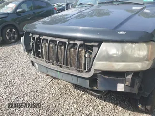 2004 Jeep Grand Cherokee Laredo with VIN 1J4GW48NX4C405558, listed as a IAAI auction lot 42440639 with 197,457 mi miles and . Bid and sale history available at DreamBid. Image 6.