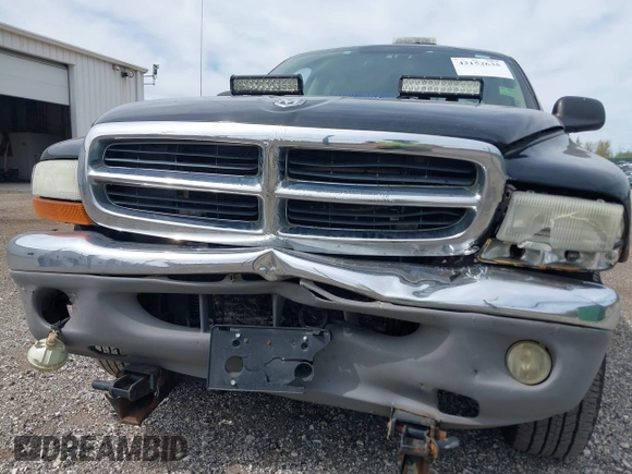 2004 Dodge Dakota SLT z VIN 1D7HG48N54S664848, wystawiony jako IAAI lot #42152635 z przebiegiem 153 824 mil mil oraz . Historia ofert i sprzedaży dostępna na DreamBid. Obrazek 6.