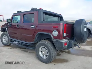 2006 Hummer H2 with VIN 5GRGN22U66H104237, listed as a IAAI auction lot 41665284 with 61,984 mi miles. Bid and sale history available at carsss.com. Image 3.