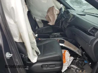 2021 Honda Passport Touring z VIN 5FNYF7H94MB005741, wystawiony jako Copart lot #57626664 z przebiegiem Nie podano mil oraz Szkoda całkowita • Salvage title. Historia ofert i sprzedaży dostępna na DreamBid. Obrazek 7.