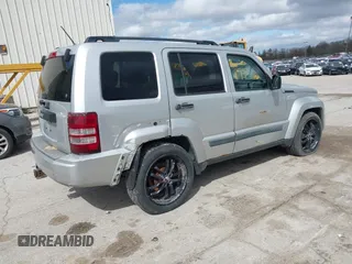 2009 Jeep Liberty Sport with VIN 1J8GN28K39W520228, listed as a IAAI auction lot 41961381 with 196,187 mi miles. Bid and sale history available at carsss.com. Image 4.