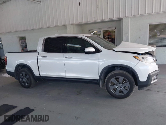 2020 Honda Ridgeline RTL-E with VIN 5FPYK3F71LB005028, listed as a IAAI auction lot 42167883 with 81,882 mi miles and . Bid and sale history available at DreamBid. Image 13.