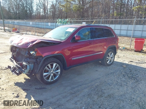 2013 Jeep Grand Cherokee Laredo with VIN 1C4RJEAG3DC631987, listed as a IAAI auction lot 41240182 with 186,193 mi miles. Bid and sale history available at carsss.com. Image 2.