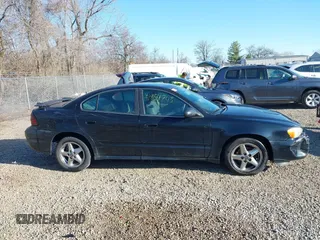2004 Pontiac Grand Am SE1 with VIN 1G2NF52E24C226396, listed as a IAAI auction lot 41854743 with 177,659 mi miles. Bid and sale history available at carsss.com. Image 13.