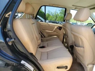 2001 Mercedes-Benz M-Class with VIN 4JGAB54E61A232157, listed as a Copart auction lot 53482584 with 137,549 mi miles and Salvage Title. Bid and sale history available at carsss.com. Image 11.