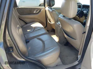 2006 Mazda Tribute i with VIN 4F2YZ02Z36KM29148, listed as a IAAI auction lot 42044163 with 175,786 mi miles and . Bid and sale history available at carsss.com. Image 8.