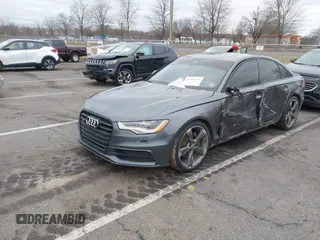 2015 Audi A6 3.0L TDI Prestige with VIN WAUHMAFC9FN036678, listed as a IAAI auction lot 41741472 with 87,932 mi miles. Bid and sale history available at carsss.com. Image 2.