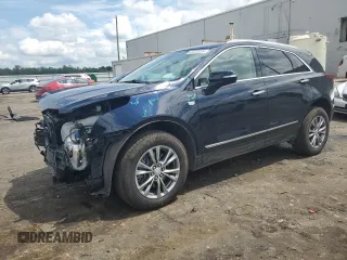 2022 Cadillac XT5 AWD Premium Luxury with VIN 1GYKNDR42NZ111086, listed as a Copart auction lot 65403035 with 38,915 mi miles and Salvage title. Bid and sale history available at DreamBid. Image 1.