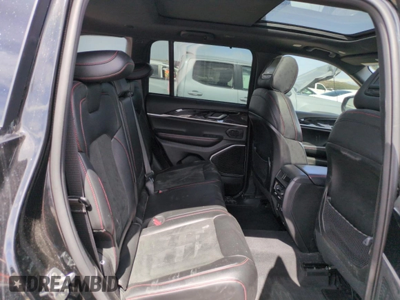 2022 Jeep Grand Cherokee Trailhawk with VIN 1C4RJHCG1N8574207, listed as a Copart auction lot 52789925 with 31,549 mi miles and Salvage title. Bid and sale history available at DreamBid. Image 10.
