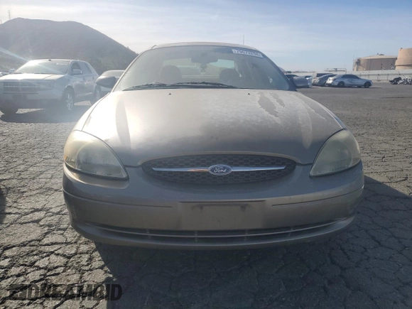2003 Ford Taurus SEL Deluxe with VIN 1FAFP56S23G221922, listed as a Copart auction lot 79673294 with 142,911 mi miles and Salvage Title. Bid and sale history available at DreamBid. Image 5.