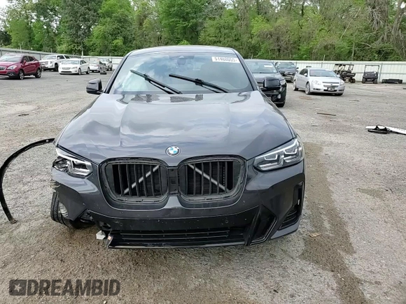 2022 BMW X4 xDrive30i z VIN 5UX33DT02N9J01520, wystawiony jako Copart lot #51488055 z przebiegiem Nie podano mil oraz Szkoda całkowita • Salvage title. Historia ofert i sprzedaży dostępna na DreamBid. Obrazek 11.