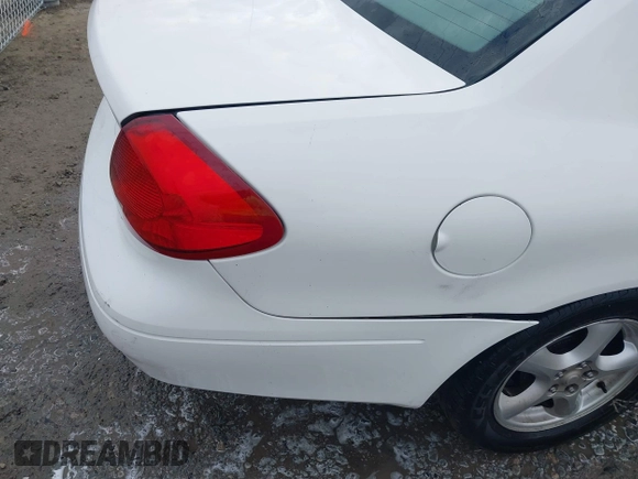 2002 Ford Taurus SES Standard with VIN 1FAFP55U12A184513, listed as a IAAI auction lot 41125306 with 241,896 mi miles. Bid and sale history available at carsss.com. Image 19.