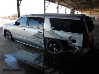 2018 Chevrolet Suburban Premier with VIN 1GNSCJKC7JR104888, listed as a Copart auction lot 68027604 with 69,632 mi miles and Salvage Title. Bid and sale history available at carsss.com. Image 2.