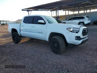 2020 Toyota Tacoma SR5 z VIN 3TMAZ5CN2LM115831, wystawiony jako Copart lot #59134155 z przebiegiem 116 532 mil mil oraz Szkoda całkowita • Salvage title. Historia ofert i sprzedaży dostępna na DreamBid. Obrazek 4.