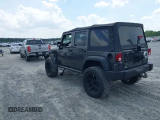 2018 Jeep Wrangler Unlimited Sport with VIN 1C4BJWDG4JL814233, listed as a IAAI auction lot 42112347 with 104,113 mi miles and . Bid and sale history available at DreamBid. Image 3.