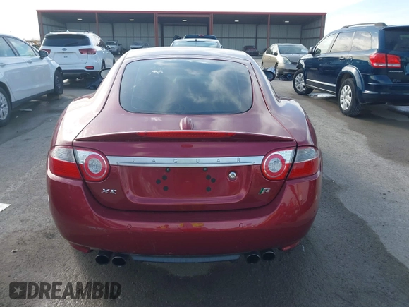 2008 Jaguar XK with VIN SAJWA43C089B22700, listed as a IAAI auction lot 41585734 with 67,946 mi miles. Bid and sale history available at carsss.com. Image 16.