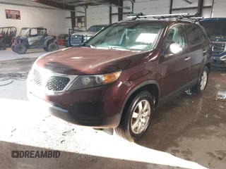2013 Kia Sorento LX with VIN 5XYKT4A27DG315059, listed as a IAAI auction lot 41571574 with 217,527 mi miles. Bid and sale history available at carsss.com. Image 18.