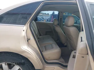 2007 Ford Five Hundred SEL z VIN 1FAFP241X7G119234, wystawiony jako IAAI lot #42142742 z przebiegiem 217 800 mil mil oraz . Historia ofert i sprzedaży dostępna na DreamBid. Obrazek 8.