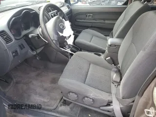 2003 Nissan Frontier XE with VIN 1N6ED27T73C433384, listed as a Copart auction lot 80153654 with 248,803 mi miles and Salvage title. Bid and sale history available at DreamBid. Image 7.