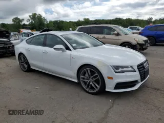 2015 Audi A7 Prestige z VIN WAU2GAFC5FN002704, wystawiony jako Copart lot #62985105 z przebiegiem 47 412 mil mil oraz Szkoda całkowita • Salvage title. Historia ofert i sprzedaży dostępna na DreamBid. Obrazek 4.