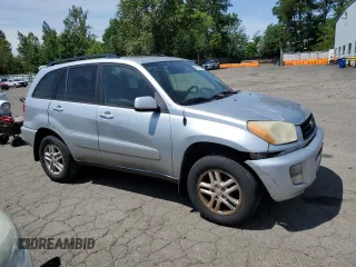 2003 Toyota RAV4 with VIN JTEGH20V936012689, listed as a Copart auction lot 61997965 with 214,693 mi miles and Clean title. Bid and sale history available at DreamBid. Image 4.