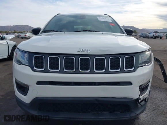 2017 Jeep Compass Sport z VIN 3C4NJDAB1HT642199, wystawiony jako IAAI lot #41237141 z przebiegiem 85 650 mil mil oraz . Historia ofert i sprzedaży dostępna na DreamBid. Obrazek 11.