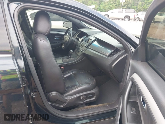 2014 Ford Taurus SEL with VIN 1FAHP2E83EG125068, listed as a IAAI auction lot 42101295 with 244,063 mi miles. Bid and sale history available at carsss.com. Image 5.