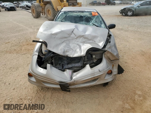 2002 Pontiac Sunfire SE z VIN 1G2JB524027308408, wystawiony jako Copart lot #61752784 z przebiegiem Nie podano mil oraz Szkoda całkowita • Salvage title. Historia ofert i sprzedaży dostępna na DreamBid. Obrazek 5.