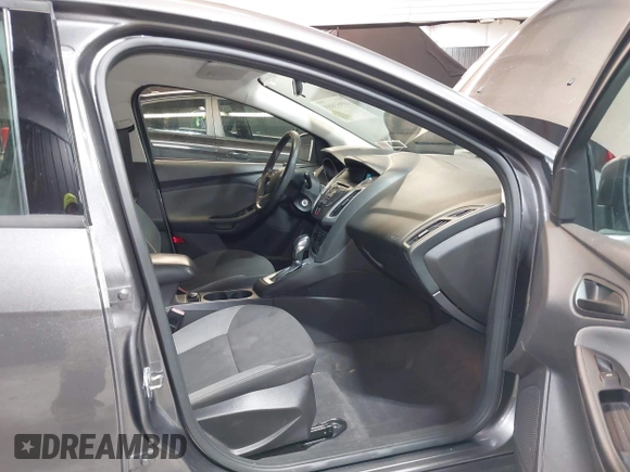 2012 Ford Focus SE with VIN 1FAHP3K22CL394088, listed as a IAAI auction lot 40953085 with 147,259 mi miles and . Bid and sale history available at carsss.com. Image 5.